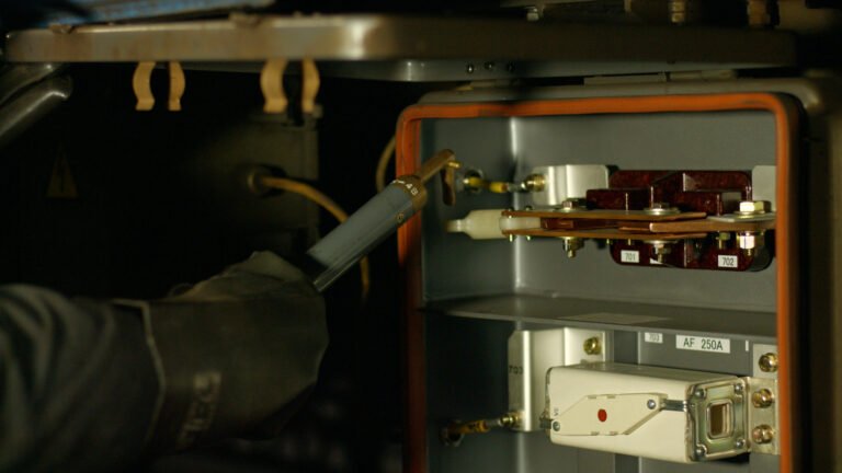 Electrician repairs mechanism. Electrician repairs mechanism. Electrical connection. Electropanel board.